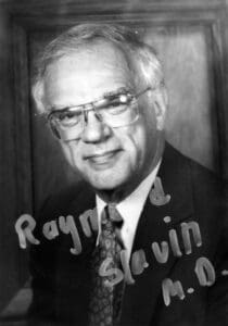 A black and white photo of an older man.