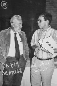 A man and a woman standing next to each other.