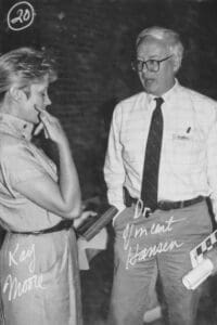 A man and woman talking to each other.
